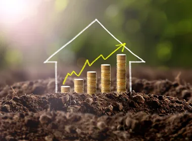 Huisje met geld stijgend