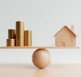 Huisje balanceert met geld